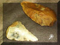 Palaeolithic hand axes.Photographed by kind permission of Mr. D. Bone, Curator of Ancient House Museum  > Simply click to enlarge... then use the [Back] button to return